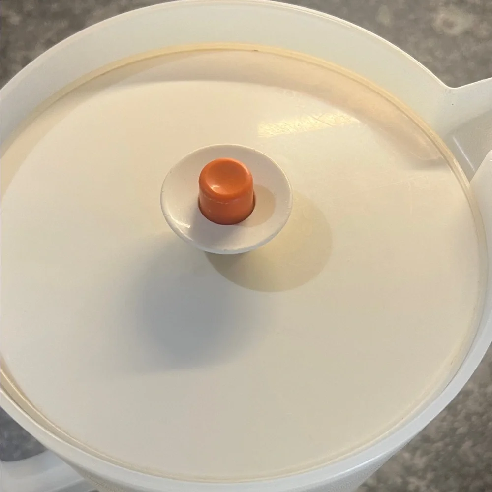 Vintage Tupperware One Gallon Translucent White Pitcher with Orange Lid.